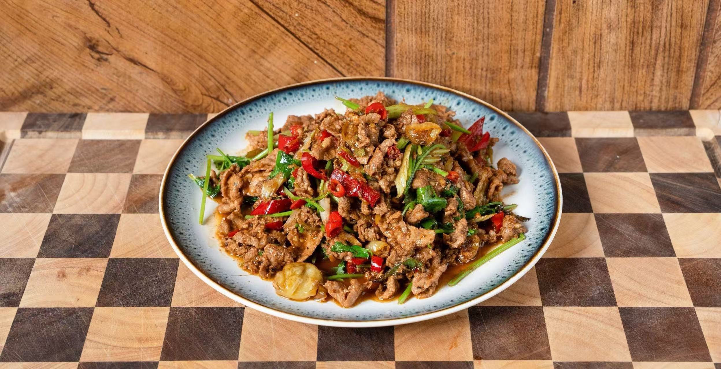 beef stir-fried with wild chili peppers